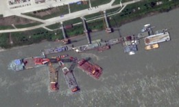 Barge-mounted cranes work at Wuchang Shipyard on the Yangtze River just outside the city of Wuhan in June 2024.