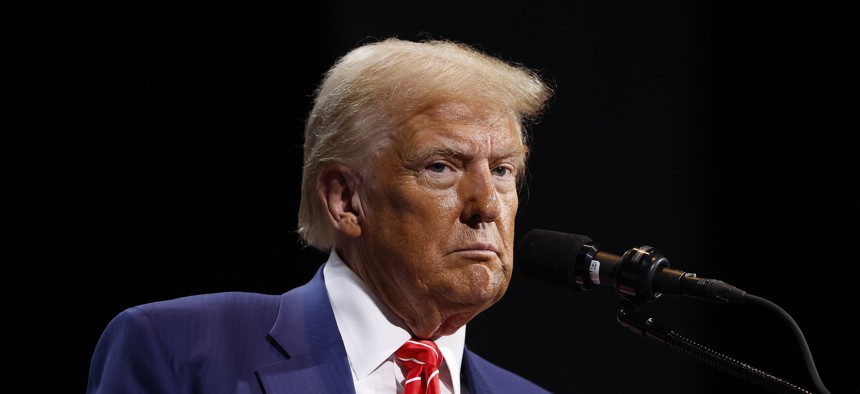 GOP presidential candidate Donald Trump delivers remarks during a campaign rally at the Cobb Energy Performing Arts Centre on October 15, 2024, in Atlanta, Georgia.