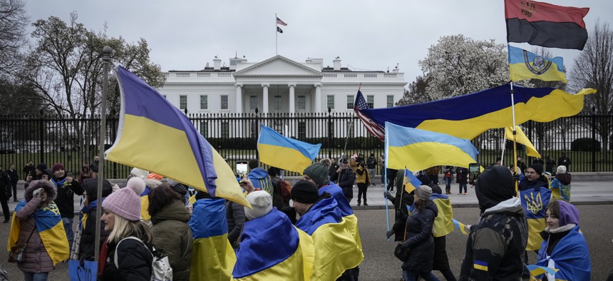 Supporters of Ukraine and members of the Ukrainian community rally near the White House to mark the one-year anniversary of Russia's invasion of Ukraine, February 25, 2023, in Washington, DC.