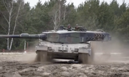 In this 2023 photo, Ukrainian troops train on the Leopard 2A4 battle tank at a military base in Poland.