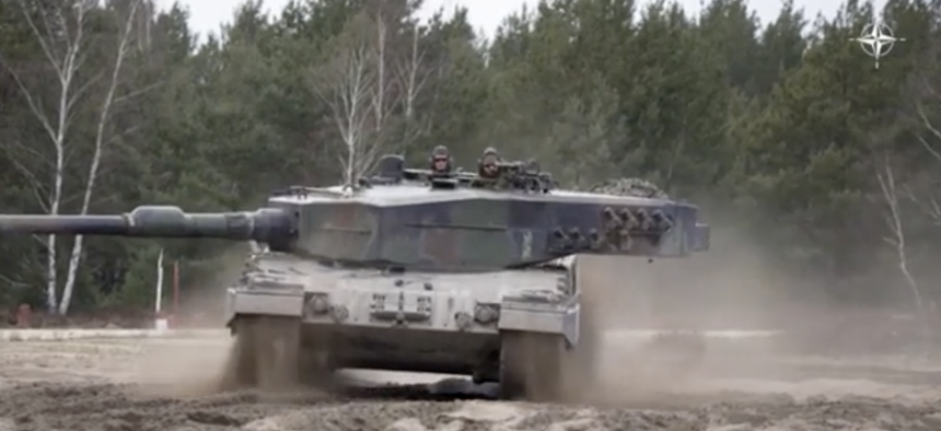 In this 2023 photo, Ukrainian troops train on the Leopard 2A4 battle tank at a military base in Poland.