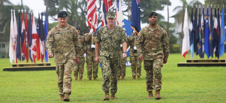 Gen. Charles A. Flynn, outgoing commander of U.S. Army Pacific (left), Adm. Samuel Paparo, commander of U.S. Indo-Pacific Command (center), and Gen. Ronald Clark, incoming U.S. Army Pacific commander (right) walk together at the U.S. Army Pacific change of command ceremony at Fort Shafter, Hawaii, Nov. 8, 2024..