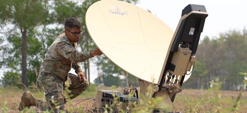 U.S. Army Cpl. Gerardo Vidal performs checks on a Scalable Network Node during exercise Cobra Gold 2023 at U-Tapao Royal Thai Navy Airfield, Thailand, March 30, 2023. 