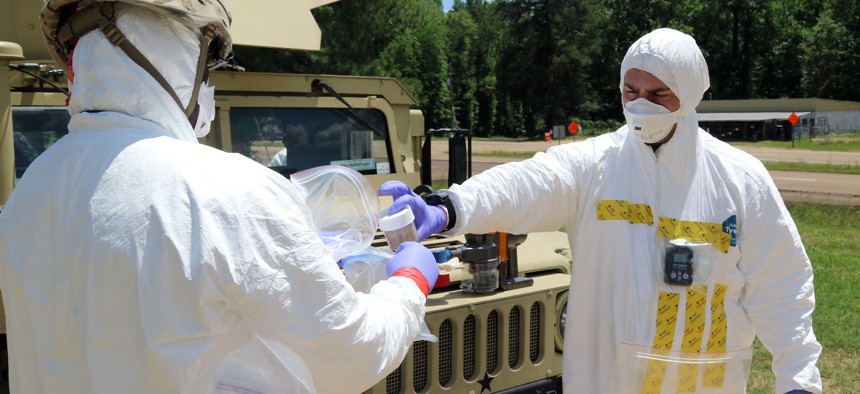 U.S. soldiers perform nuclear forensics ground collection during an exercise in Mississippi in spring 2024. 