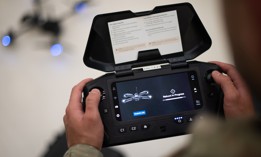 A U.S. Air Force member performs a system reboot before flying a Skydio X2D drone during a drone aircraft inspection program training at Travis Air Force Base, Calif., July 16, 2024.