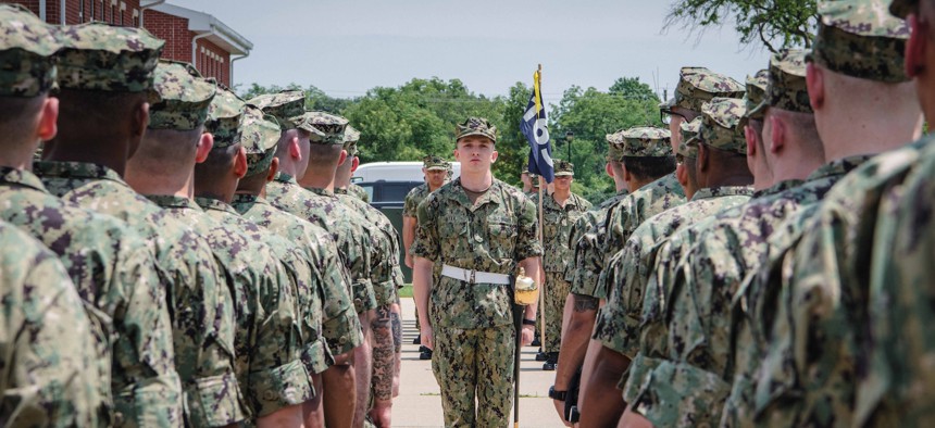 Recruits stand in formation at U.S. Navy boot camp, in Great Lakes, Ill. 