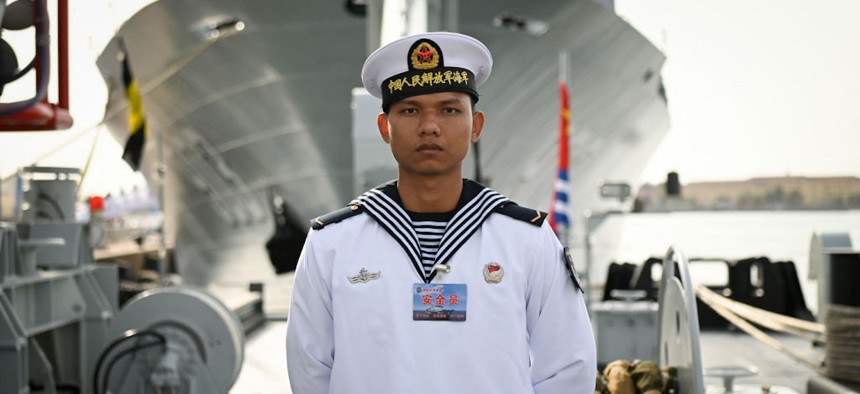 This picture taken during a media tour shows personnel onboard the People's Liberation Army Navy's Hongzehu comprehensive submarine rescue ship during an open day to mark the navy's 75th anniversary, at a port in Qingdao, China's Shandong province on April 20, 2024.