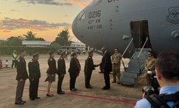 U.S. Defense Secretary Lloyd Austin is greeted upon his arrival in Vientiane, Laos, on Nov. 19, 2024.