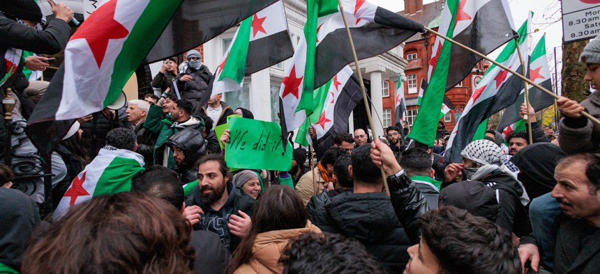 Six days after Russia's Dec. 1 airstrikes on rebel positions in Idlib, Syria, protestors demonstrated in front of the Russian embassy in London, UK.