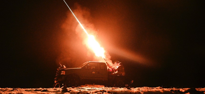 Ukrainian mobile air defense troops fire a machine gun at Russian drones during a night patrol in Chernihiv Oblast, Ukraine, on December 2, 2024.