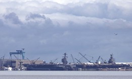 USS Gerald R. Ford (CVN 78) prepares to moor next to Pre-Commissioning Unit John F. Kennedy (CVN 79) at Newport News Shipyard, Virginia, on Aug. 20, 2021. 