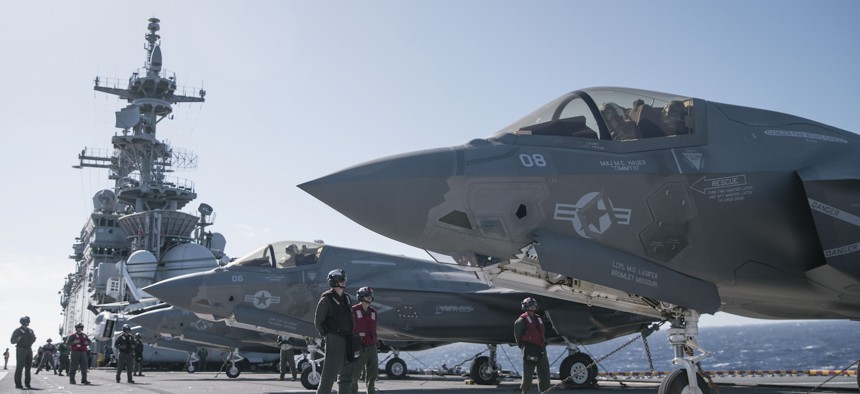 U.S. Marine Corps F-35B Lightning II aircraft attached to Marine Fighter Attack Squadron (VMFA) 225, 15th Marine Expeditionary Unit, conduct preflight checks aboard the amphibious assault ship USS Boxer (LHD 4) in the Pacific Ocean Nov. 20, 2024.