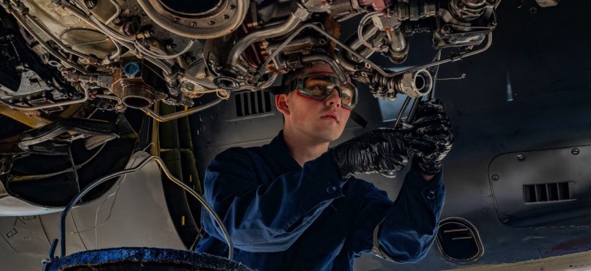 A U.S. Air Force airman performs preflight maintenance on a B-52H Stratofortress during Exercise Bayou Vigilance at Barksdale Air Force Base, La., April 3, 2024. 