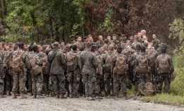 U.S. Marine Corps Capt. Stephen Satchell, the commanding officer of Delta Company, Infantry Training Battalion, School of Infantry – East, speaks to Marines after the culminating event of the Infantry Marine Course at Camp Lejeune, North Carolina, Sept. 13, 2024. 