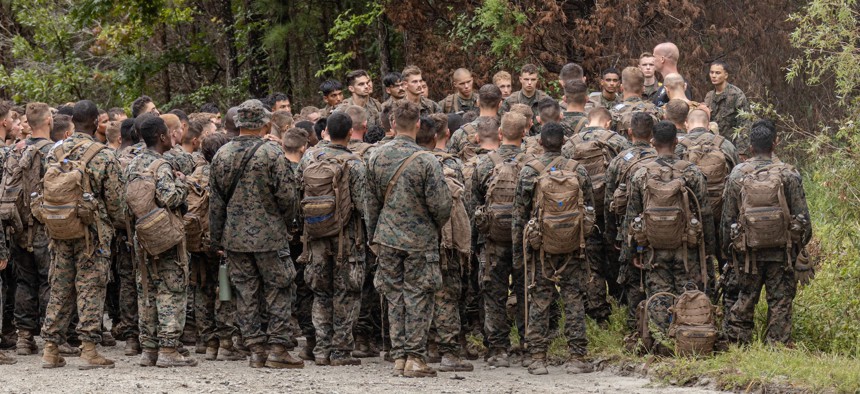 U.S. Marine Corps Capt. Stephen Satchell, the commanding officer of Delta Company, Infantry Training Battalion, School of Infantry – East, speaks to Marines after the culminating event of the Infantry Marine Course at Camp Lejeune, North Carolina, Sept. 13, 2024. 