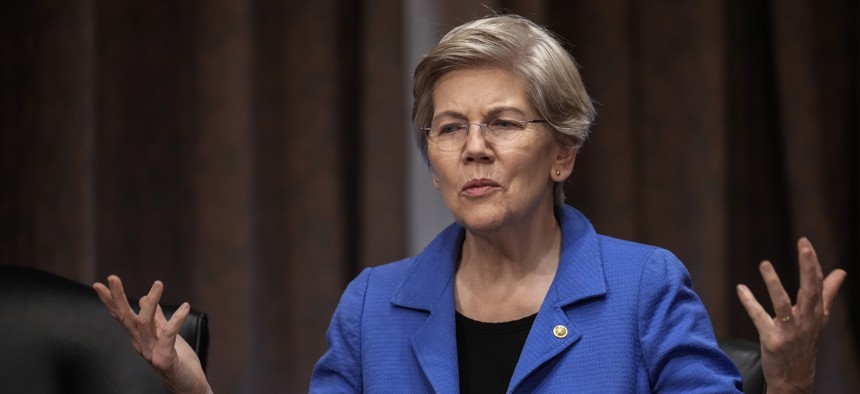 Sen. Elizabeth Warren, D-Mass., pictured here before a Senate hearing in April 2023, is among the lawmakers who have called for an end to unfunded priority lists.