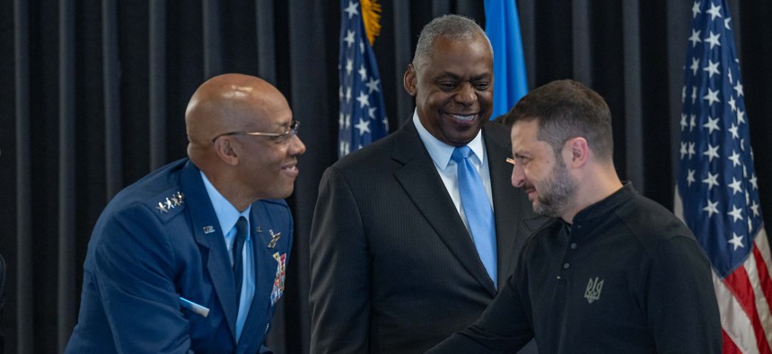 Secretary of Defense Lloyd Austin and Gen. CQ Brown Jr., chairman of the Joint Chiefs of Staff, greet Ukrainian President Volodymyr Zelensky during the Ukraine Defense Contact Group at Ramstein Air Base, Germany, Sept 6, 2024. 