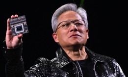 Nvidia CEO Jensen Huang shows off a new chip during his keynote presentation at CES 2025 in Las Vegas, Nevada, on January 6, 2025.