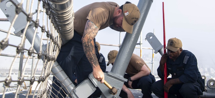 Aviation Boatswain’s Mate (Handling) 3rd Class Patrick Rizik assembles a ballistic net aboard the Wasp-class amphibious assault ship USS Makin Island (LHD 8), Oct. 24, 2024.