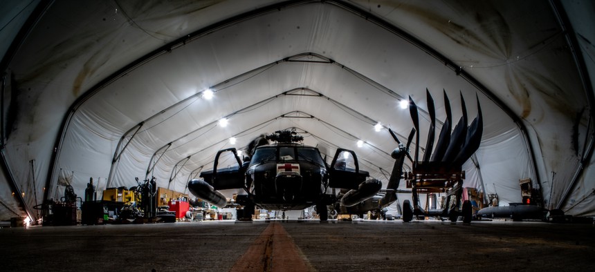 Paratroopers assigned to the 3-82 General Support Aviation Battalion, 82nd Combat Aviation Brigade, 82nd Airborne Division conduct maintenance on a UH-60 on April 21, 2024.