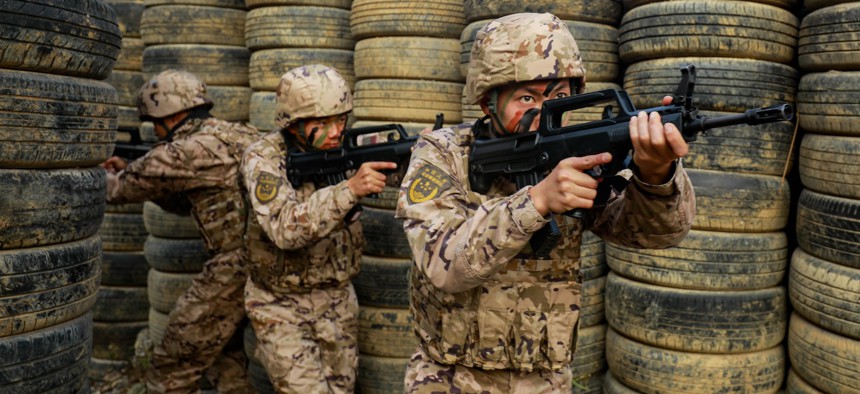 SWAT soldiers conduct a combat anti-terrorism drill in Hechi city, China, January 15, 2025.