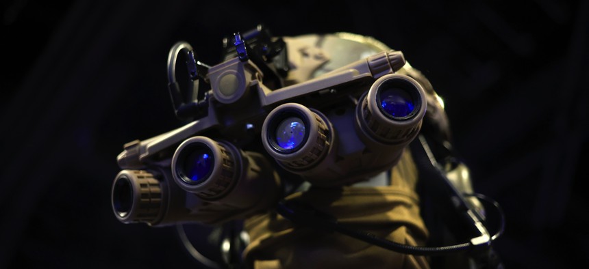 A mannequin displays quad night vision goggles on the exhibit floor at Special Operations Forces (SOF) Week at the Tampa Convention Center on May 8, 2024, in Tampa, Florida.