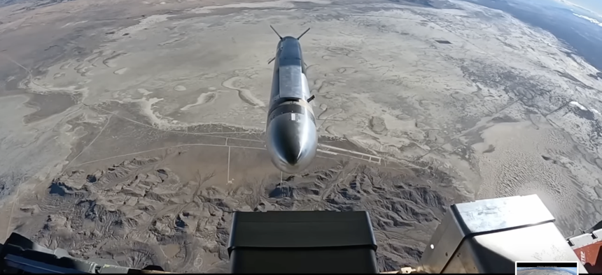 A "Black Arrow"—formally, a Leidos Small Cruise Missile—ejects from an AC-130J aircraft in a successful guided flight test last November.