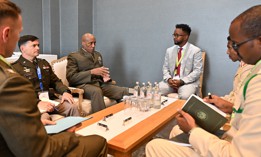 U.S. Marine Corps Gen. Michael Langley, commander U.S. Africa Command (third from left) and U.S. Army Maj. Gen. Brian Cashman, commander of CJTF-HOA (second from left) meets with Maj. Gen. Odowaa Yusuf Rageh, Somalia's chief of defense, (second from right) during the 2025 African Chiefs of Defense Conference in Nairobi, Kenya, May 28, 2025..