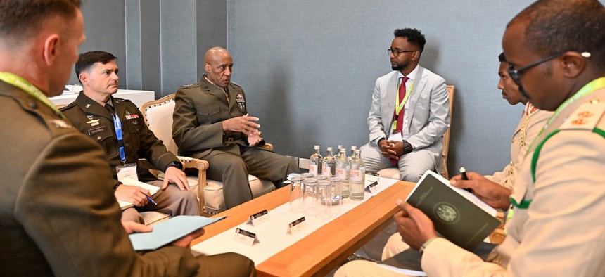 U.S. Marine Corps Gen. Michael Langley, commander U.S. Africa Command (third from left) and U.S. Army Maj. Gen. Brian Cashman, commander of CJTF-HOA (second from left) meets with Maj. Gen. Odowaa Yusuf Rageh, Somalia's chief of defense, (second from right) during the 2025 African Chiefs of Defense Conference in Nairobi, Kenya, May 28, 2025..