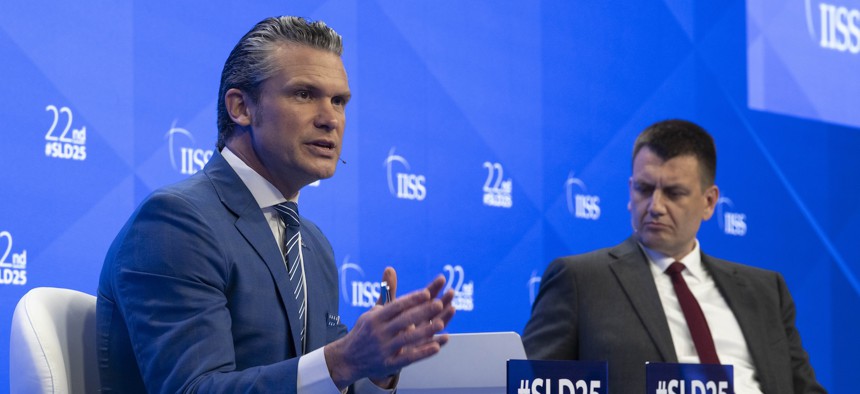 Defense Secretary Pete Hegseth participates in a Q&A session alongside International Institute for Strategic Studies Director-General and Chief Executive Bastian Giegerich at the 22nd Shangri-La Dialogue in Singapore, May 30, 2025.