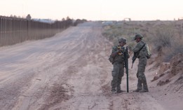U.S. Army Spc. Jesus Montano and Pfc. Valentino Pappalardi, assigned to 76th Engineer Company, with Joint Task Force–Southern Border, assemble a sign marking the New Mexico National Defense Area near Sunland Park, New Mexico, May 21, 2025.