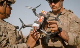 Army Sgt. Jacob Rosencrantz, right, and Sgt. 1st Class Elio Sauceda, paratroopers assigned to the 173rd Airborne Brigade, prime a brazier charge with a M17A1 receiver and power on a first-person view drone during exercise African Lion 2025 in Tunisia, April 27, 2025.