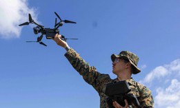 A U.S. Marine Corps corporal with the School of Infantry-West trains with a drone at MCB Camp Pendleton, Calif., on May 14, 2025. 