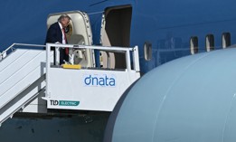 President Donald Trump boards Air Force One after attending a NATO summit, in The Hague, Netherlands, on June 25, 2025. 