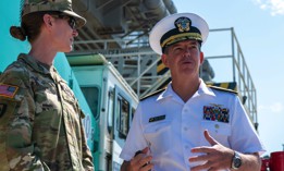 Rear Adm. Buzz Donnelly, right, Commander, Carrier Strike Group (CSG) 5, speaks with Army Col. Alison Batig, director, Brian D. Allgood Army Community Hospital, after the USS Ronald Reagan (CVN 76) pulled in to Busan, Republic of Korea, on Sept. 23, 2022.