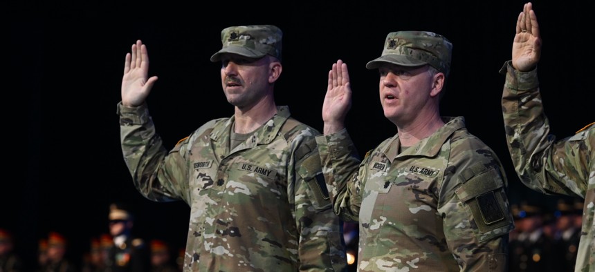 U.S. Army Lt. Col. Andrew Bosworth and U.S. Army Lt. Col. Bob McGrew recite the oath of office during a Detachment 201: The Army’s Executive Innovation Corps commissioning ceremony at Joint Base Myer-Henderson Hall, Va., June 13, 2025..