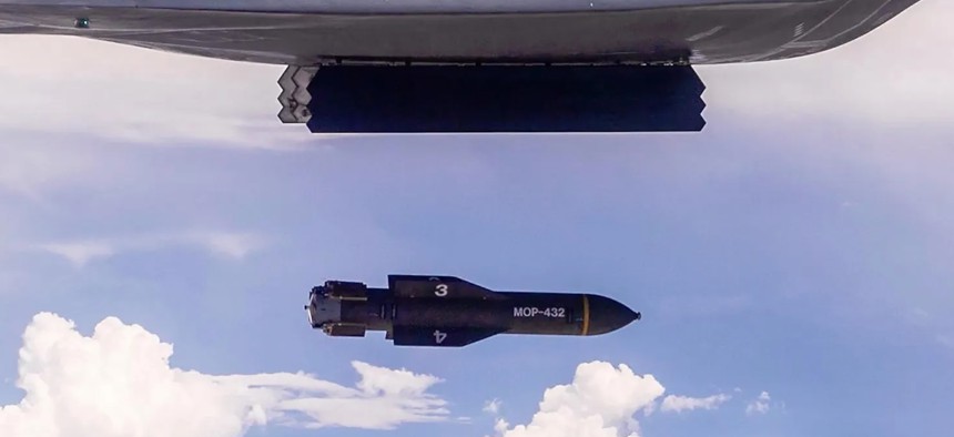 A B-2 bomber test-drops a GBU-57/B Massive Ordnance Penetrator (MOP) bomb, which grew out of work led by a Vietnamese refugee and immigrant.