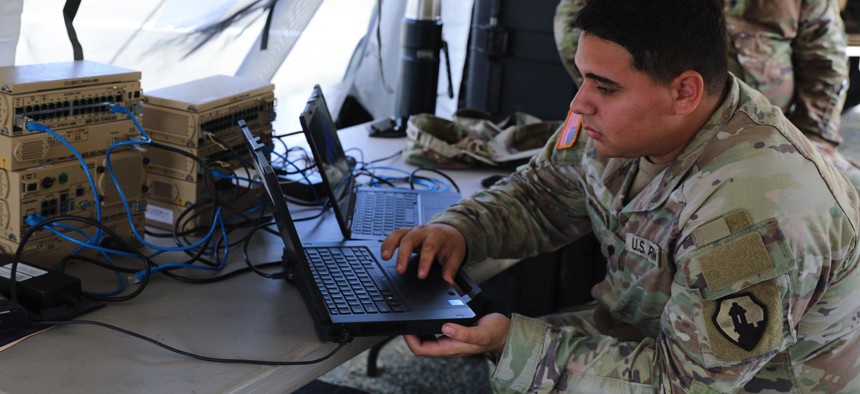 An Army Reserve network communications systems specialist with 1st Mission Support Command tests a node at Antonio Rivera Rodríguez Airport in Vieques, Puerto Rico, on July 24, 2025.