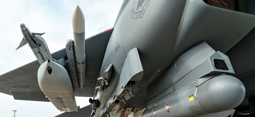 Air-launched missiles account for a good chunk of the AIr Force's 2025 unfunded priority list. Here, an F-15E Strike Eagle is loaded with five JASSMs at Eglin Air Force Base, Fla., May 11, 2021