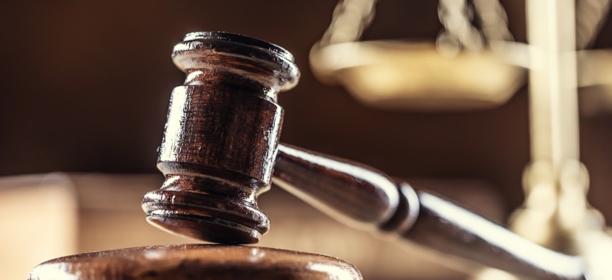 A district court’s injunction, a Justice Department attorney said Tuesday, is precluding agencies from potentially sending follow-up letters to probationary employees "clarifying the reasons for termination.” 