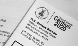A close up photo of the the US Census Bureau's American Community Survey (ACS) packet. 