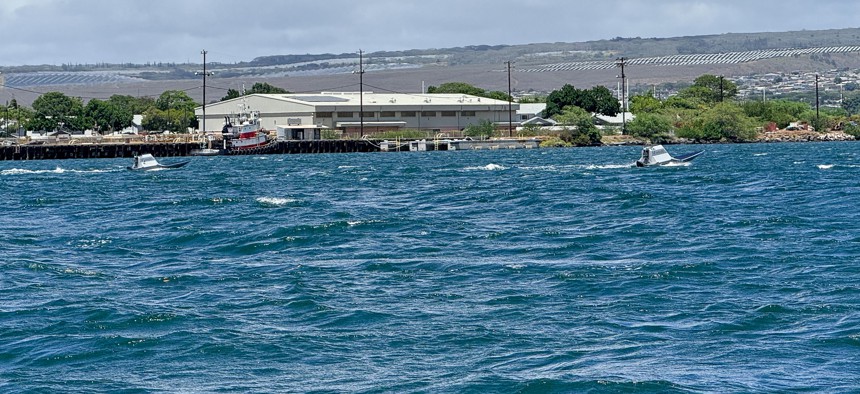 Drone boats from HavocAI zip through the waters of Pearl Harbor as part of an Army xTech experiment, Sept. 9, 2025.