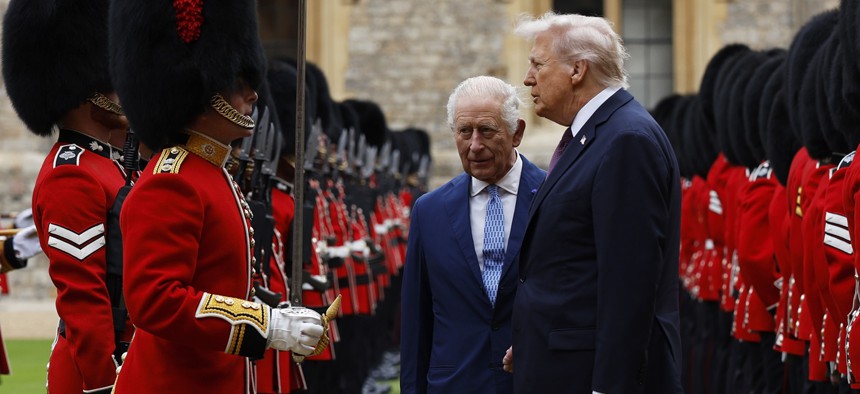 King Charles III and US President Donald Trump inspect the Guard of Honour at Windsor Castle during the latter's state visit on September 17, 2025, in Windsor, England.
