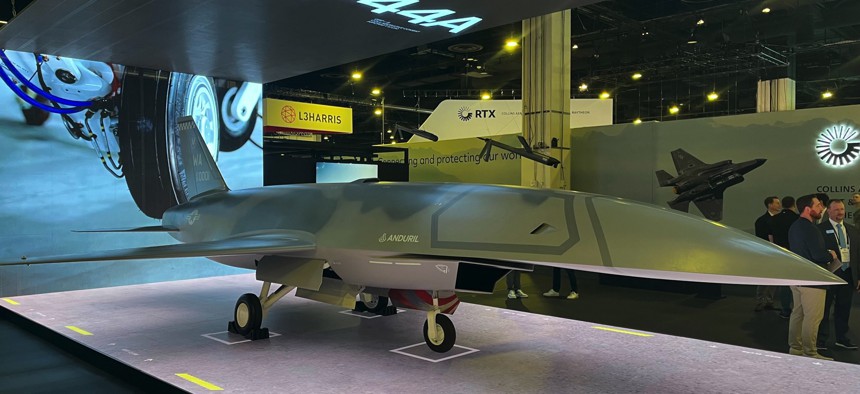 Anduril's booth at the 2025 Air, Space & Cyber Conference outside Washington, D.C., prominently featured the YFQ-44 Fury collaborative combat aircraft.