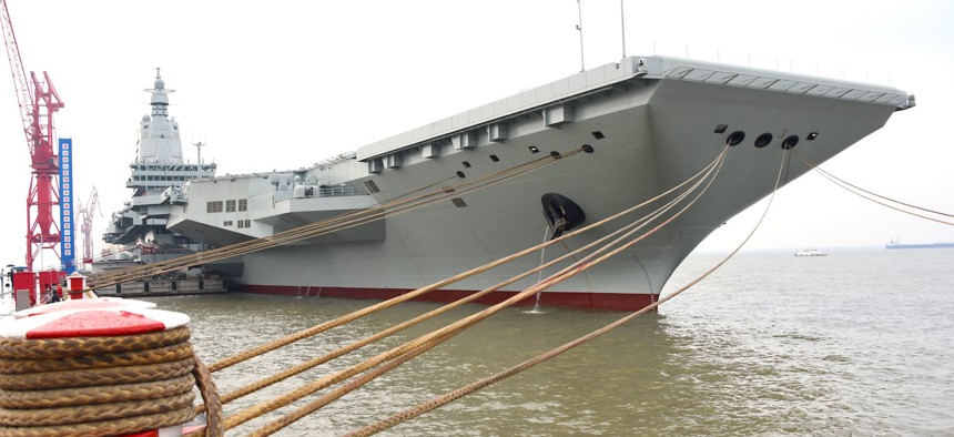 China's third aircraft carrier, the Fujian, sets out for maiden sea trials from Shanghai Jiangnan Shipyard in Shanghai, May 1, 2024.