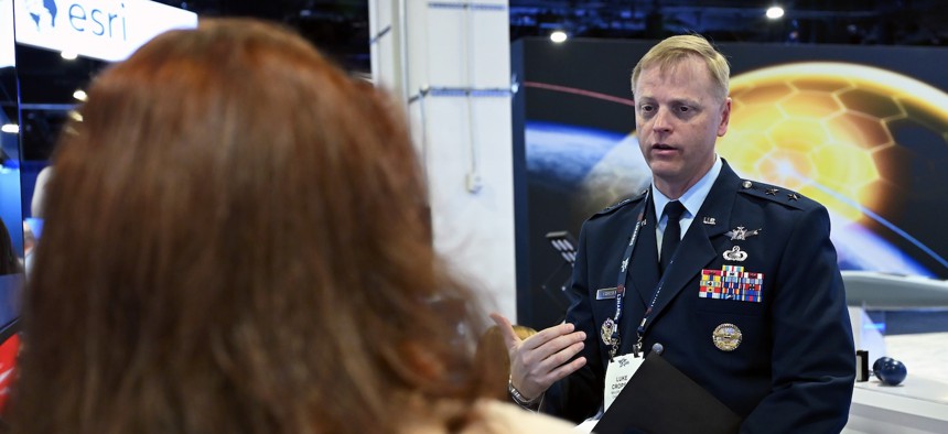 Maj. Gen. Luke Cropsey talks to industry members during the Air, Space and Cyber Conference, Sept. 23, 2025.