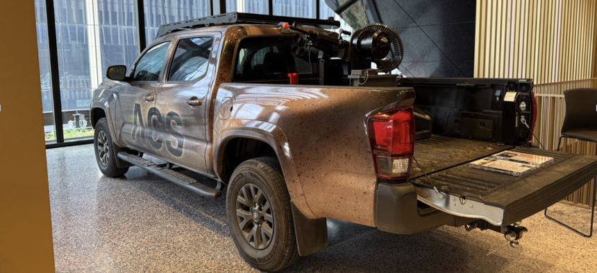 ACS’s Bullfrog mounted on the back of a pickup truck, in Detroit during the Reindustrialize summit.
