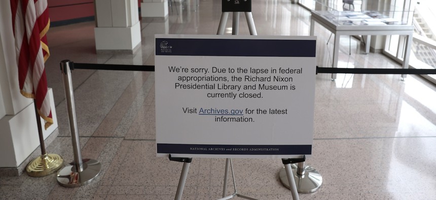 A sign telling visitors that sections of the Richard Nixon Presidential Library & Museum are closed due to the government shutdown is posted on Oct. 3, 2025 in Yorba Linda, Califo. Large portions of the Richard Nixon Presidential Library & Museum are closed to the public as the government shutdown continues after Congress failed to pass a funding bill. 