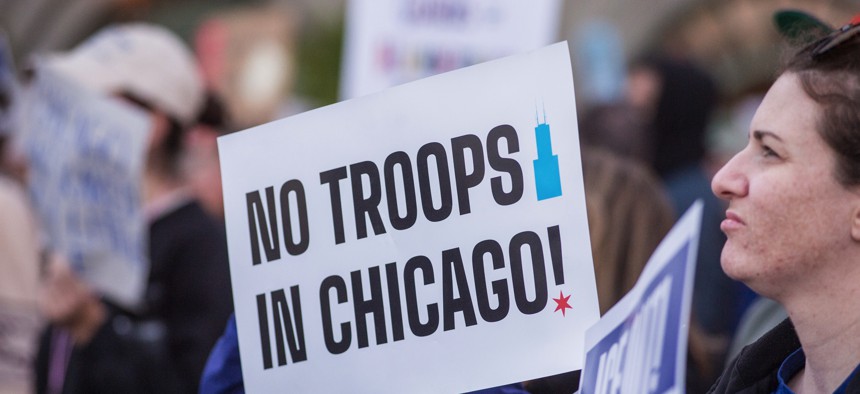 Crowds gather in downtown Chicago for a rally to oppose ICE and National Guard presence in Chicago on October 8, 2025.