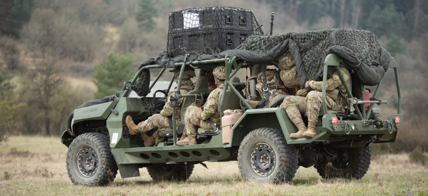 U.S. soldiers assigned to 2nd Brigade Combat Team, 101st Airborne Division, ride in the M1301 Infantry Squad Vehicle during exercise Spectrum Blitz 25 in Germany, April 10, 2025.